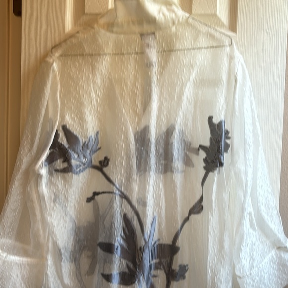 This is a beautiful gray duster. Never worn. Price 149.00 price tag still on - Picture 4 of 6